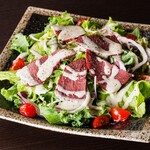 Smoked horse meat caesar salad
