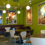 Go!Go!Wimpy  - アメコミなどのポスターが貼られた店内。２階席もある様子。