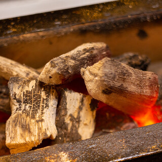 Delicious authentic charcoal-grilled yakitori slowly grilled using Tosa Bincho Yakitori (grilled chicken skewers).