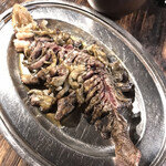 焼鳥丸万 - もも焼き骨付き