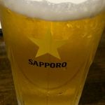 珉珉 - 生ビール。サッポロでした。通常は580円？だが今回は100円。