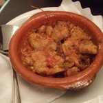 ポキート - 豚白モツのトマト煮