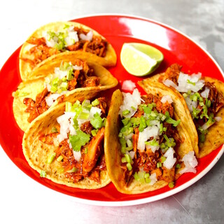 Very popular! Rotating chicken spice grilled tacos