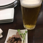 SHIGI china kitchen - お通しは鷄モツのオイル漬け？
                        これだけでビールおかわりいけます。