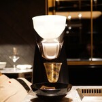 西麻布 焼肉 X - 胡麻絞り器