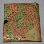 つた金 - 海苔の紙包み