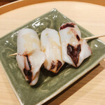 温石 - じんどういか。縁日のイカ焼きの香りが漂います