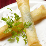 2 fried spring rolls with mozzarella cheese and basil