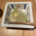 炭火ビストロ　華泉 - お通しの冬瓜のジュレ掛けです