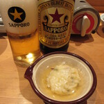 博多もつ鍋 前田屋 - 瓶ビール(税別630円)とお通し(税別380円)