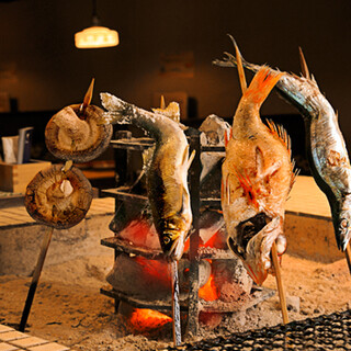 Our recommendation! Primitive grilled seasonal fish that is slowly grilled over time