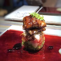 日本料理 TOBIUME - ＊刻んだ胡瓜やトマト、山芋はお酢で和えられていて「うざく」のイメージだとか。 鰻と共に頂くとサッパリします。