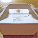 Kase Bokujou - ケーキの入った紙箱