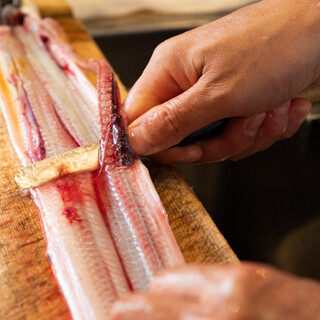 After ordering, we prepare and skewer the live eel...you will be amazed at its freshness and taste.