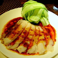 中国料理孝華 - 蒸し豚のスライス特製ソースかけ