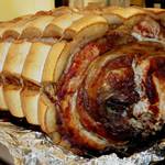 トラットリア 29 - 【‘12.6肉の日イベント】カウンターにドーンと鎮座していた、カット前のポルケッタ♪