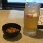 南の居酒屋 かいゆうてい - お通し・オリオンビール