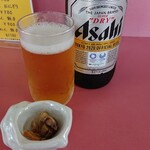 どさん娘 - お通しのサザエ醤油煮がビールに合って美味しい！