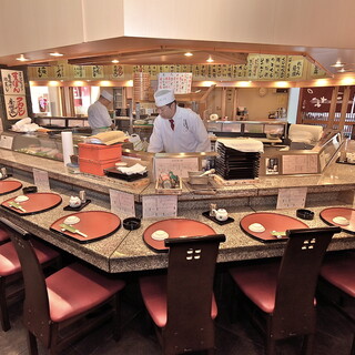 Craftsmen in front of the counter