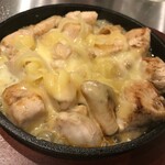 Grilled chicken fillet with melty cheese