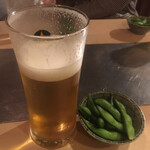 炭火焼 ゆうじ - 生ビール　ちょっと飲んじゃった