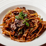 Stir-fried kishimen rice noodles with special tamari soy sauce and wagyu beef