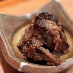 アナゴちらし小町 - お通し　魚のアラ煮