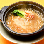 Special grade shark fin stew in earthenware pot served in hot water
