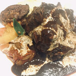 フランス地方料理レストラン MOMOKA - 骨付き鹿の首肉赤ワイン煮込み