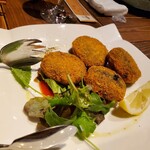 海鮮 イタリアンバル ルチアーノ - イカスミのライスコロッケトマトソースです！