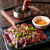 肉もつ屋 神坊 - 料理写真:石焼和牛レバー480円(写真は二人前)