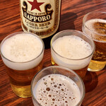 丸千葉 - 瓶ビール 赤星 大瓶 650円。