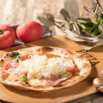 Raspadura pizza with Prosciutto and tomato
