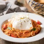 Pasta with tomatoes and burrata cheese