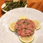 Roasted coarse green onions served with Korean seaweed