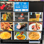 リパブリュー - 外階段の降り口に置かれた看板