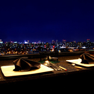 Special seats at the counter with a panoramic view of Sapporo.