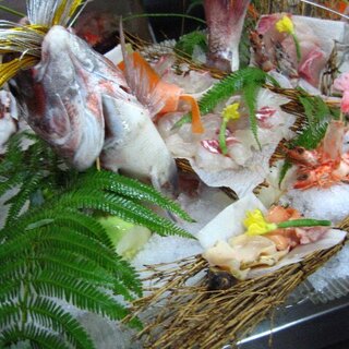 Our proud raw fish dishes! Fresh seafood Sushi and sashimi prepared after ordering