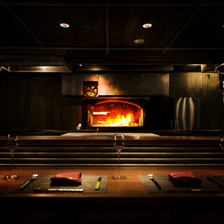 Open kitchen and wood-fired oven that stimulate the senses