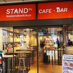 STAND by bookandbedtokyo - 店の入口を駅の改札側から見る。