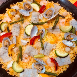 The famous paella, packed with the delicious flavors of the ingredients, is a must-try!