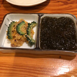 奄美鶏飯と島料理の鳥しん - お通し。もずくとニガウリ味噌和え。南国らしい
      
      メニューです