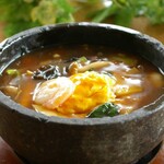 Stone-grilled Tenjin rice with melty soft-boiled egg