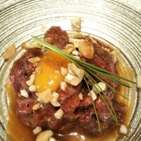 焼肉 喰心 - にんにくユッケ