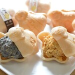 松月 - とら吉クリームサンド☆サクサク食感の新感覚モナカ！かわいいトラの形のモナカの皮です！お味はきなことごまの二種類です。