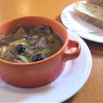 イタリアンカジュアルダイニング何駄感駄 - 砂肝とニンニクのアヒージョ