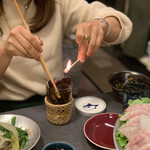 てっちり光 - ヒレ酒に着火