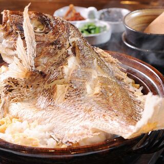 Copper pot rice with famous red sea bream cooked in a kamado using Sado Koshihikari ice-cold aged rice