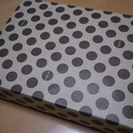 カゴノオト - 包み紙に包まれた箱