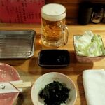 のんき - お通し・キャベツ・生ビール